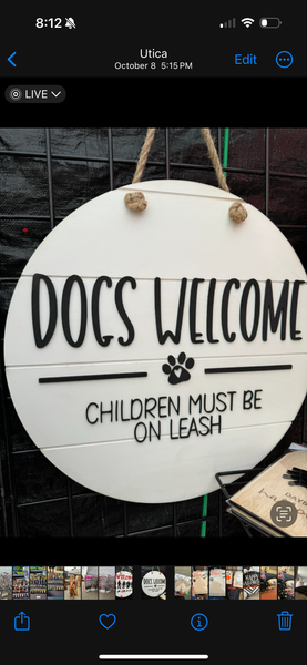 Dogs welcome children must be on leash door hanger
