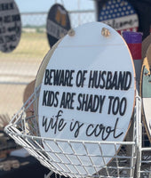 Beware of husband, kids are shady too, wife is cool door hanger